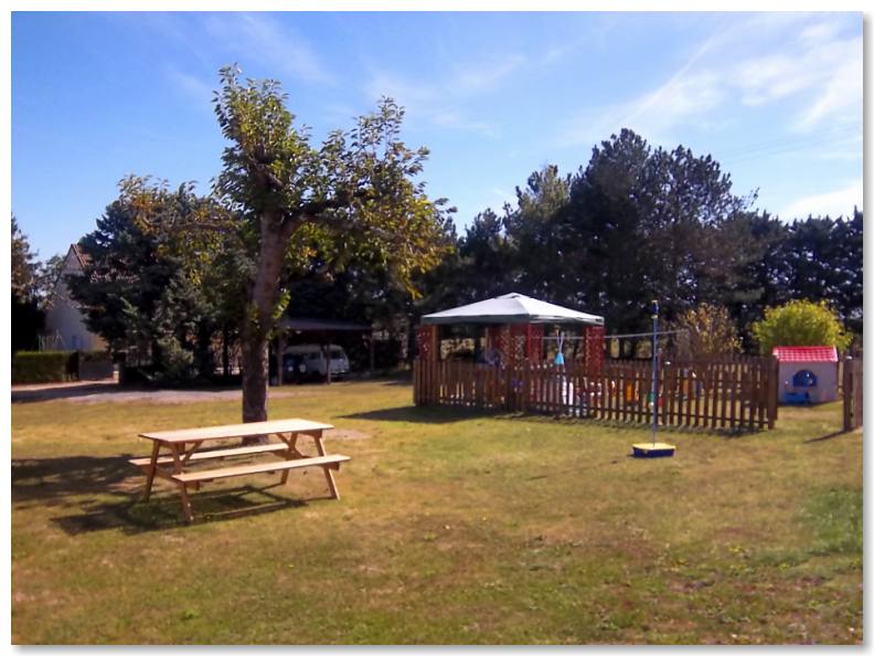 Outdoor table by the childrens play area