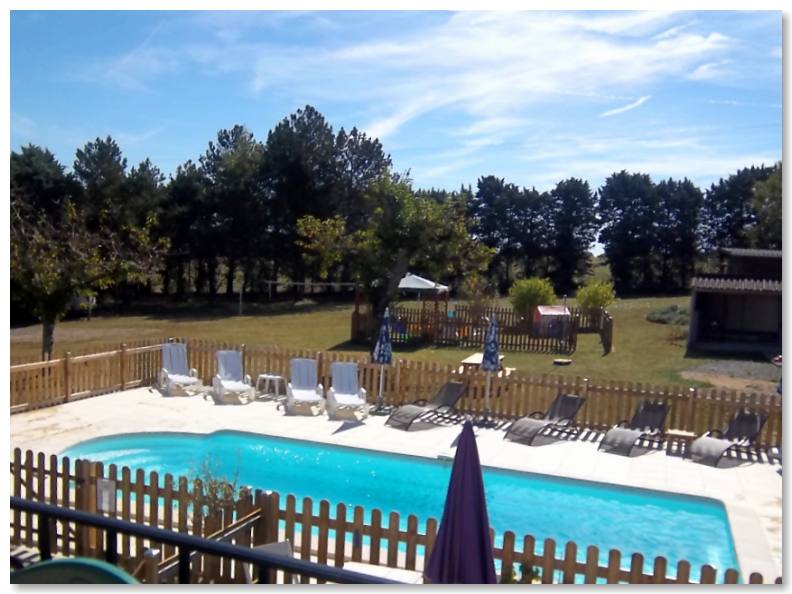 Outdoor swimming pool and sun bathing area