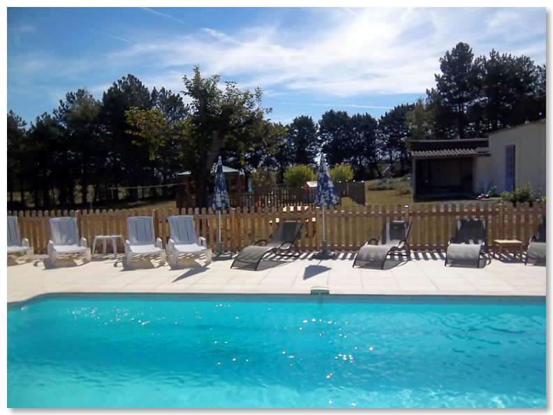 Outdoor swimming pool and sun bathing area